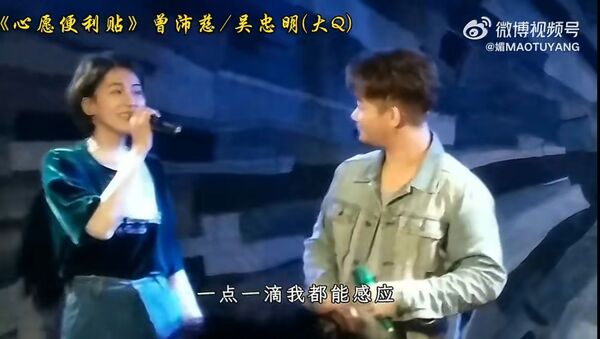 過去曾沛慈曾與吳忠明也曾合唱過〈心願便利貼〉。(網路圖片)