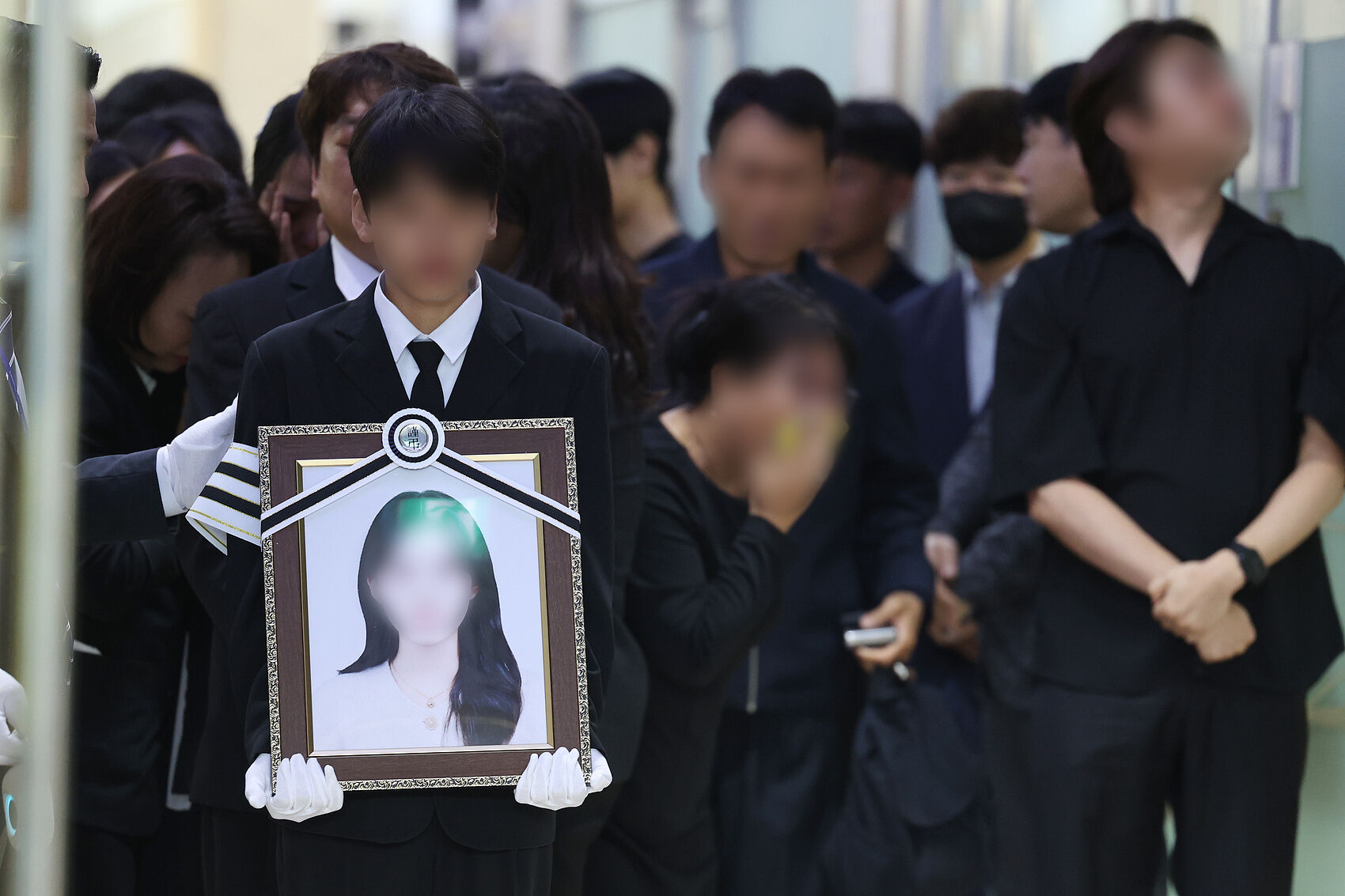 ▲▼南韓光州17歲女高中生李彩媛遭張允基砍殺身亡，5月7日出殯。（圖／VCG）