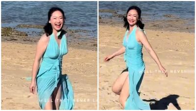 王俐人正面高衩「開到腿根」!風一吹…養眼畫面全被拍 50歲解鎖第一次