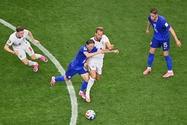 ▲克羅埃西亞「魔笛」莫德里奇（Luka Modric）對位三獅軍團隊長凱恩（）。（圖／達志影像／美聯社）
