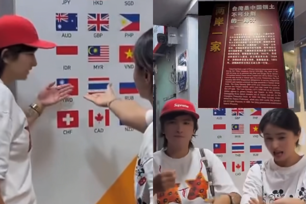 ▲2名成年人在這面牆前，用手語表達台灣是中國不可分割的一部分。（圖／翻攝自快手）