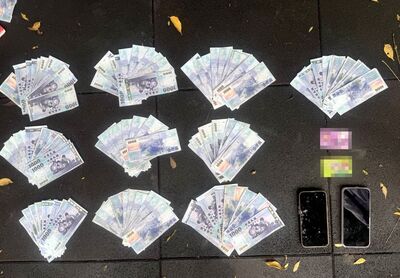 桃警逮外籍車手！ATM狂領現金露餡查扣10萬贓款　鈔票鋪滿地