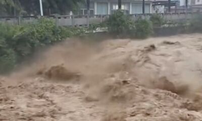 海南五指山暴雨淹成一片！車在路上漂移　全市「五停一關」應急
