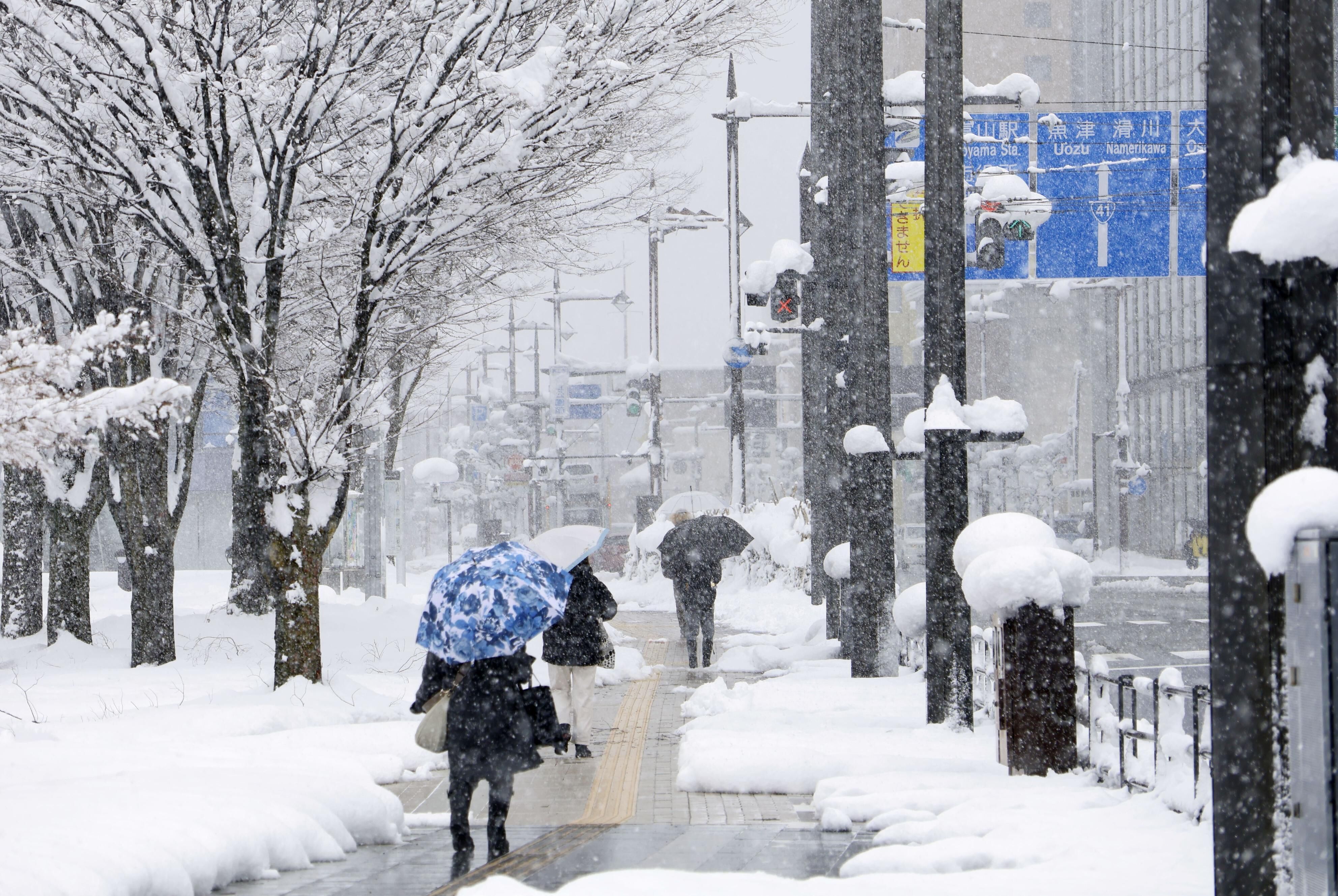 ▲▼日本富山縣富山市市中心雪景。（圖／達志影像）